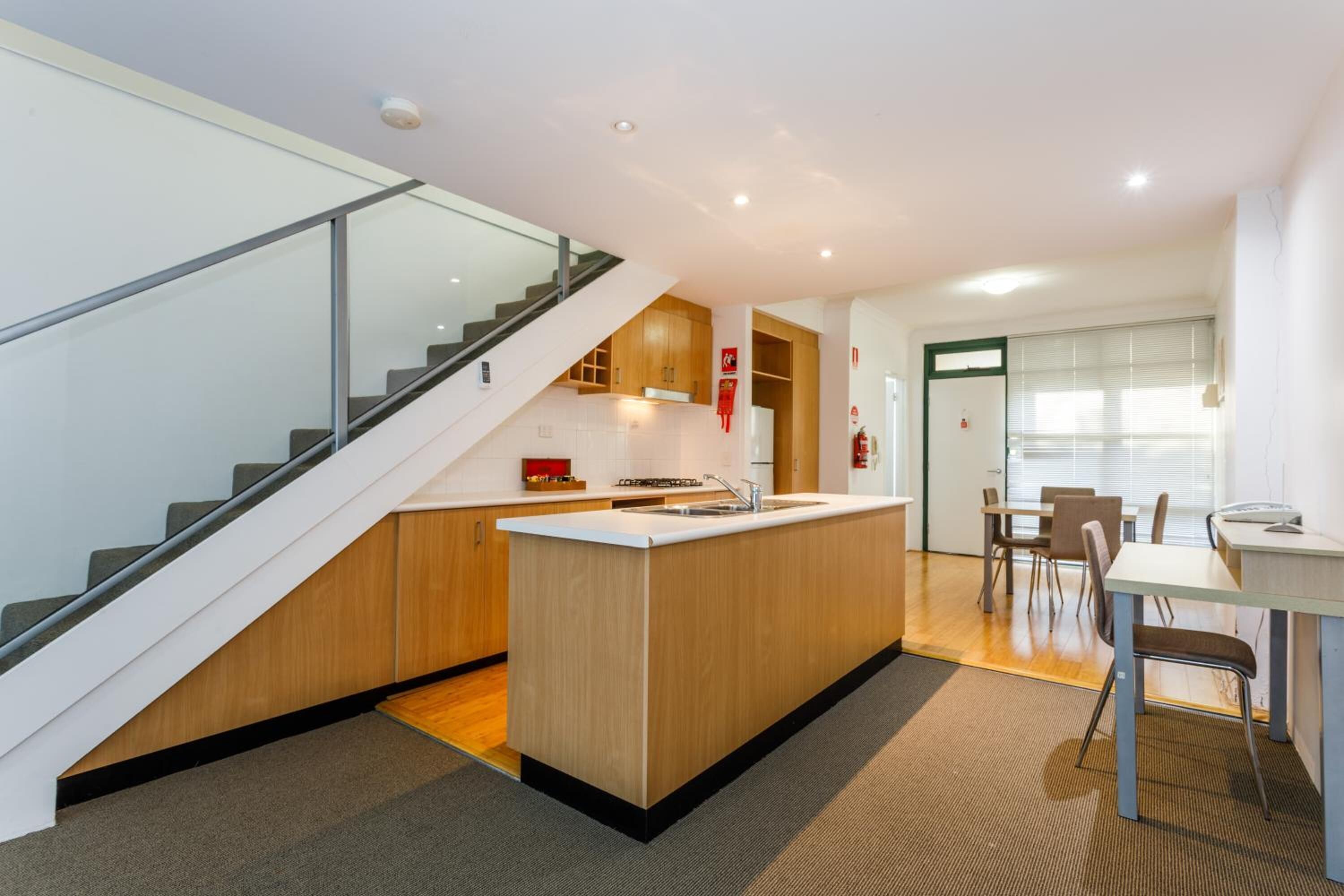 Two Bedroom Townhouse | Private kitchen | Fridge, microwave, coffee/tea maker, electric kettle