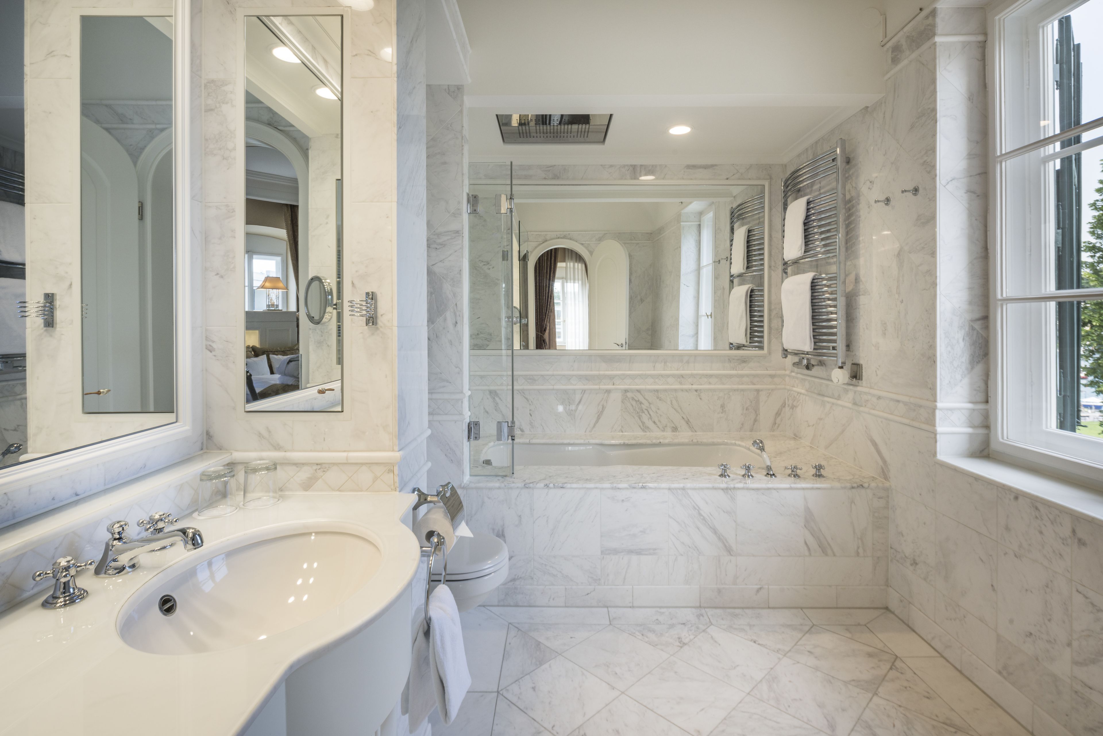 suite, tower (no balcony) | bathroom | deep-soaking bathtub, rainfall showerhead, designer toiletries