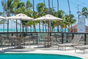 Outdoor pool, free cabanas, pool umbrellas