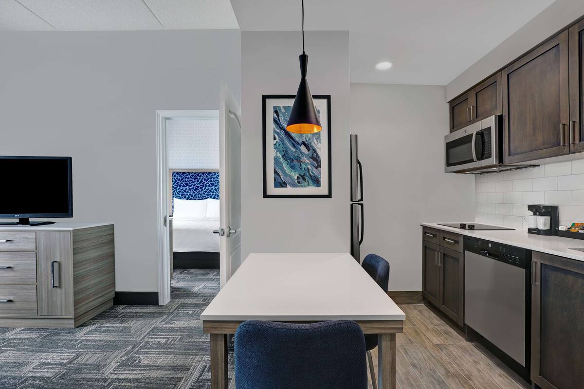 suite, 1 bedroom, non smoking (1 king bed) | private kitchen | fridge, microwave, stovetop, dishwasher