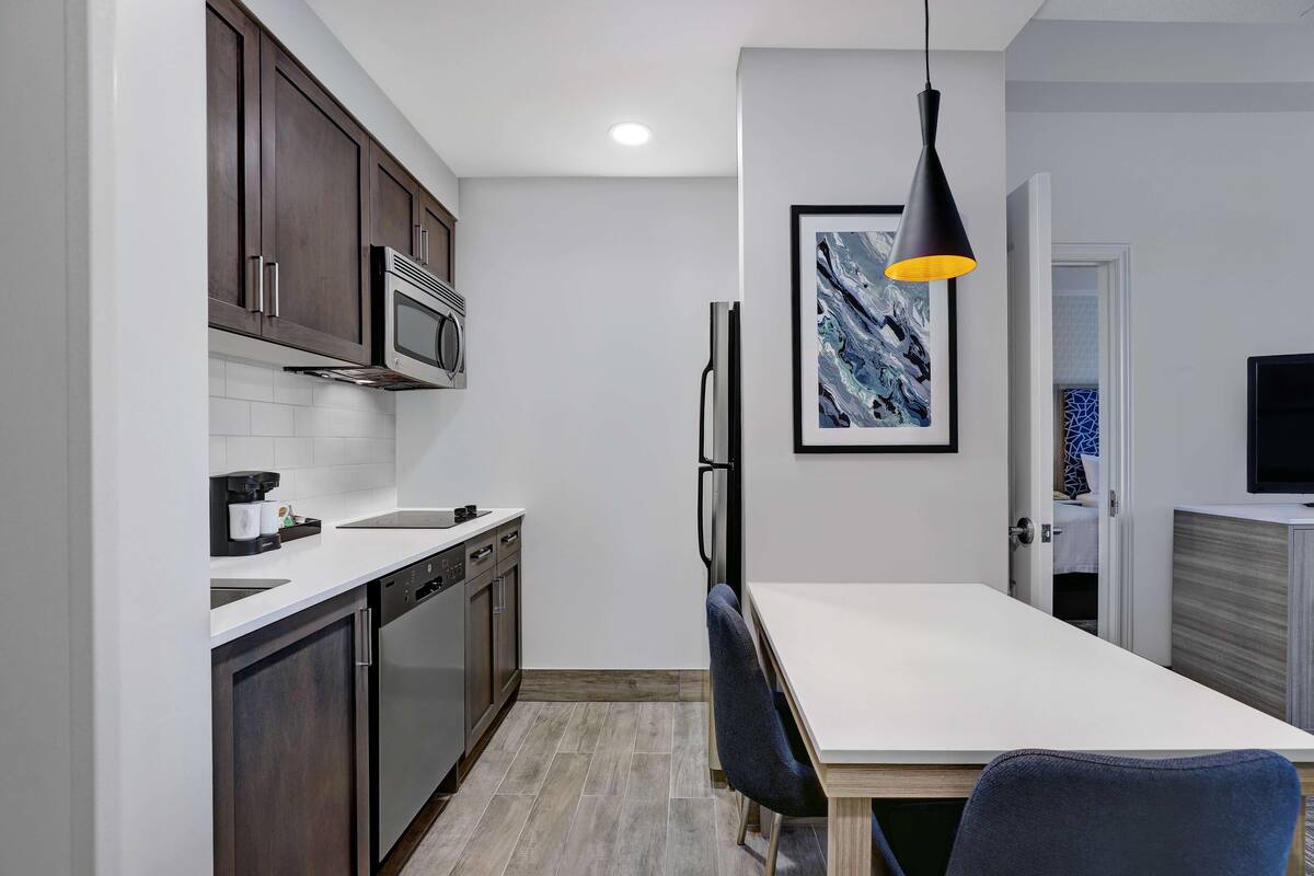 suite, 1 bedroom, non smoking (2 queen beds) | private kitchen | fridge, microwave, stovetop, dishwasher