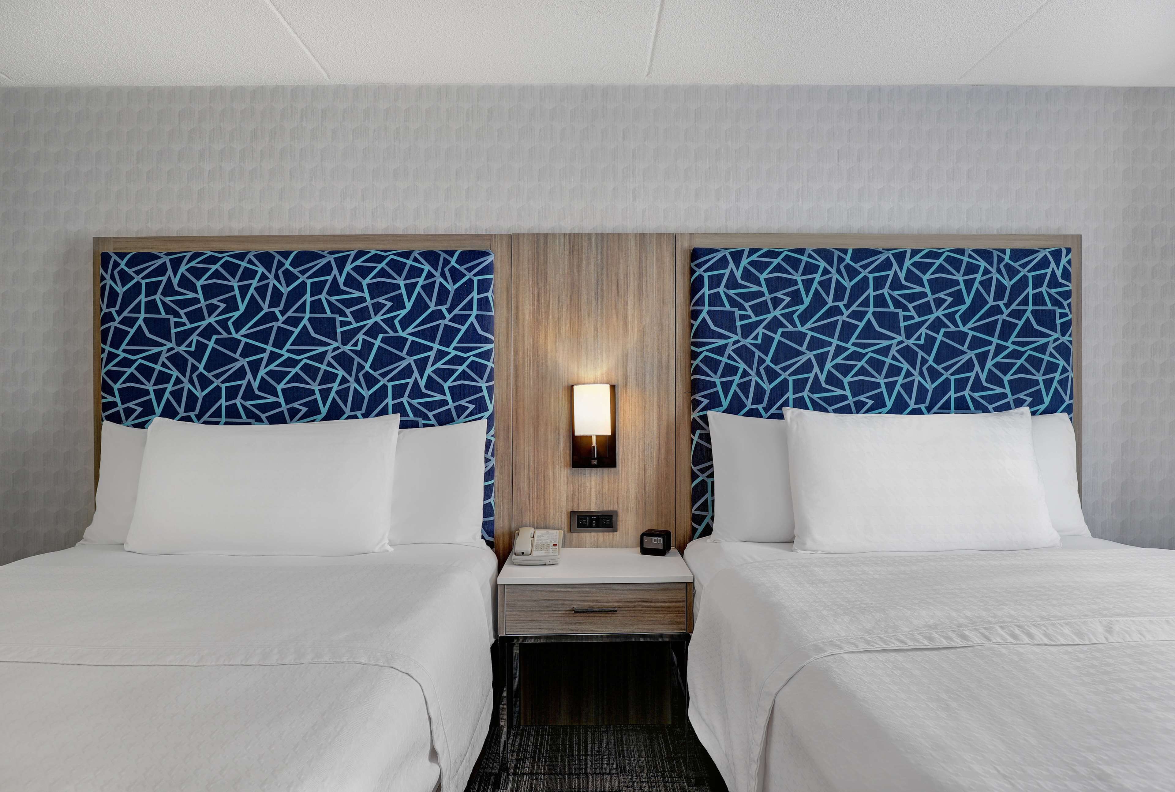 suite, 1 bedroom, non smoking, fireplace (2 queen beds) | premium bedding, in-room safe, soundproofing, iron/ironing board