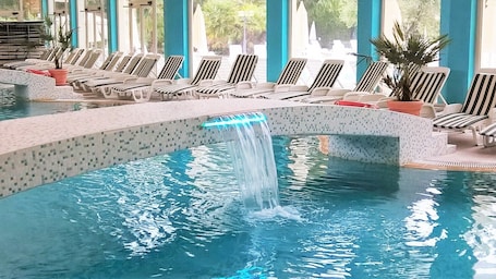 Indoor pool, seasonal outdoor pool, pool umbrellas, sun loungers