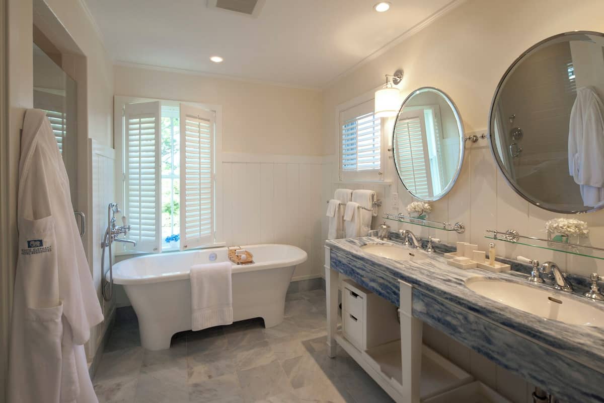 designer toiletries, hair dryer, bathrobes, slippers