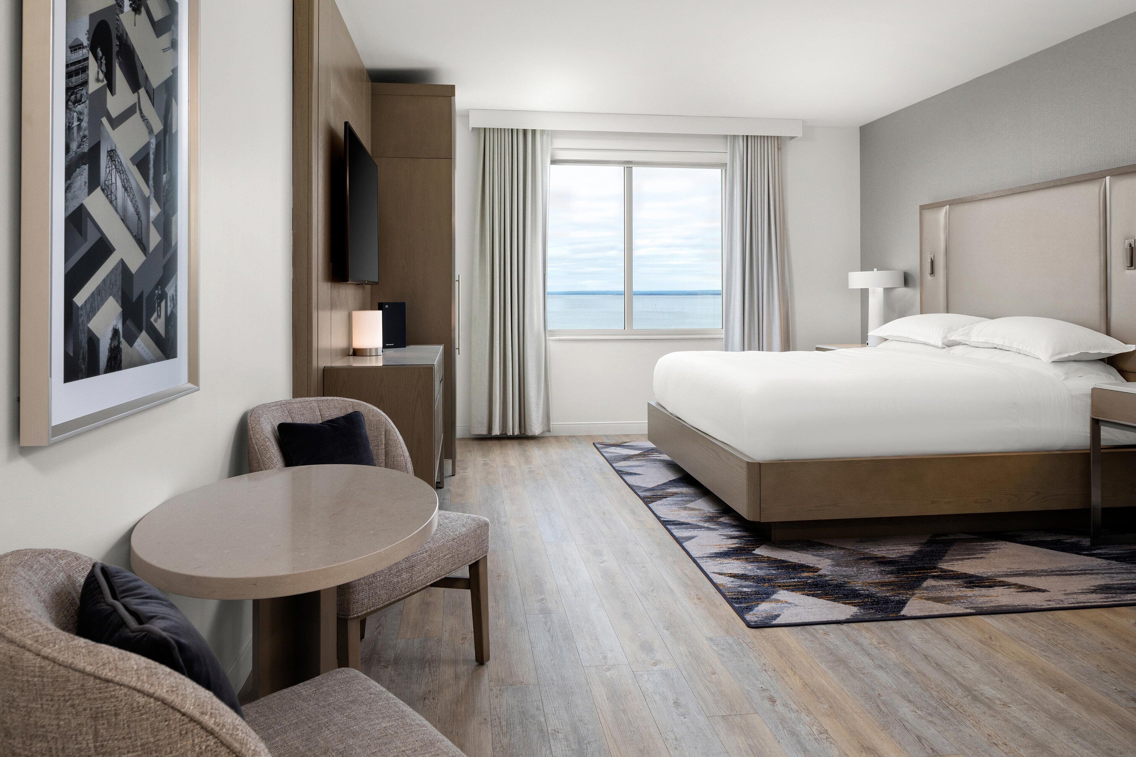 premium bedding, desk, blackout curtains, iron/ironing board