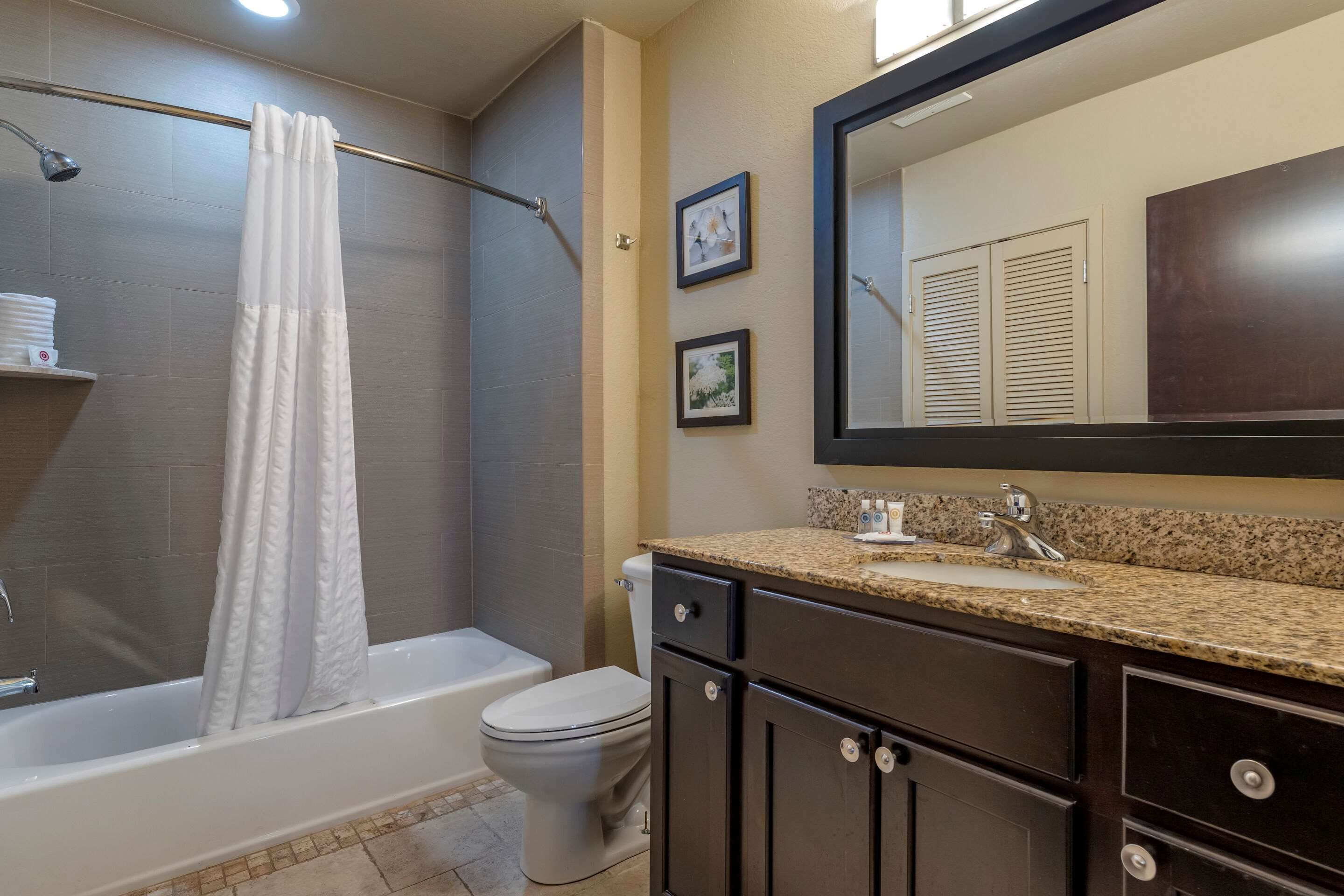 deep-soaking bathtub, hair dryer, towels