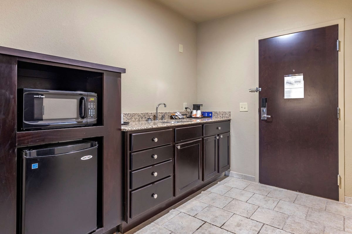 premium bedding, desk, blackout curtains, iron/ironing board