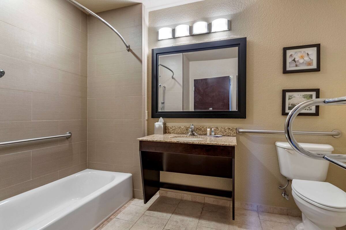 deep-soaking bathtub, hair dryer, towels