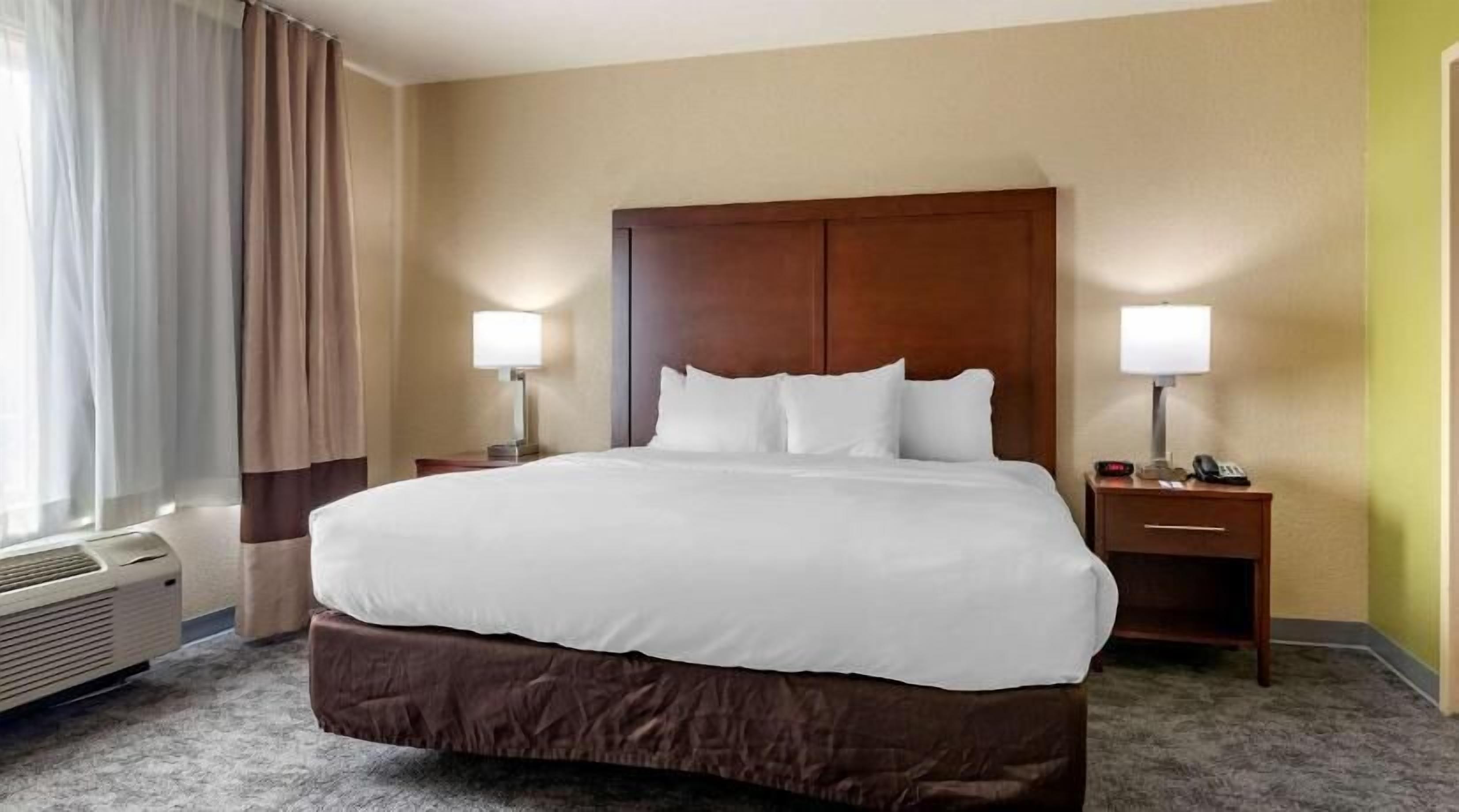 Premium bedding, desk, blackout drapes, iron/ironing board