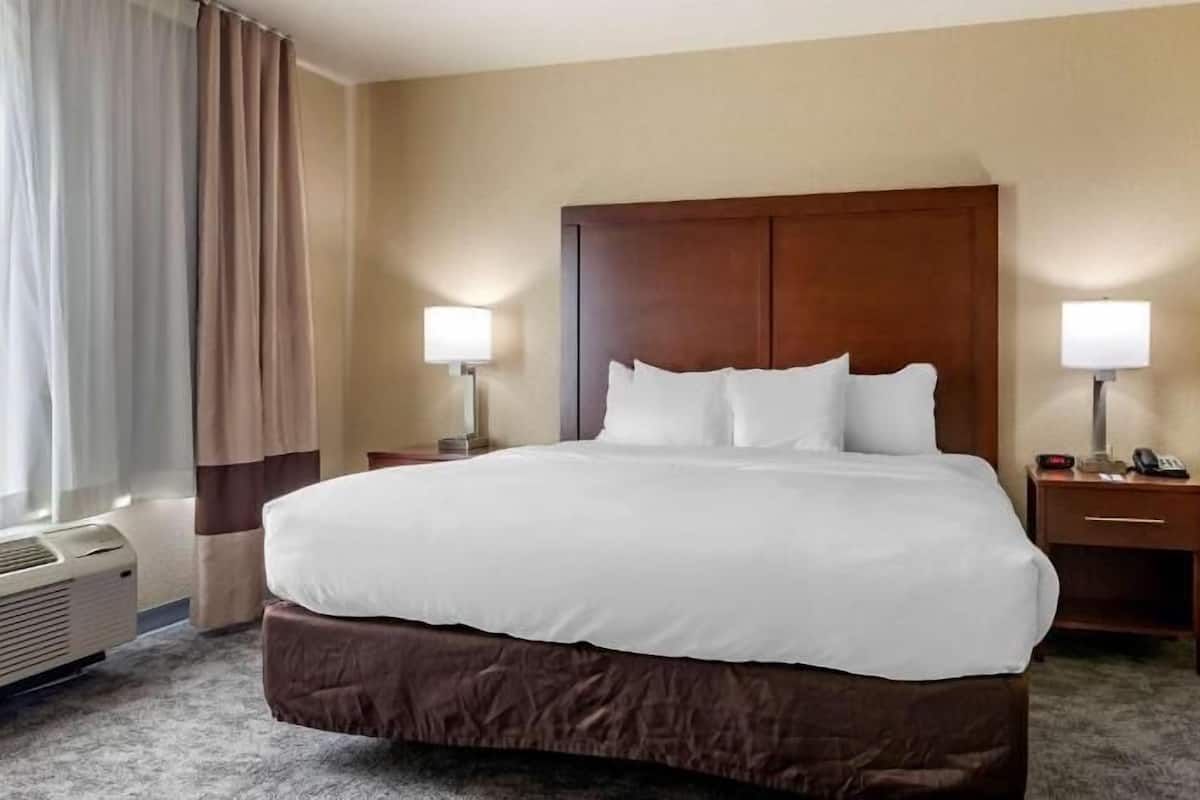 Premium bedding, desk, blackout drapes, iron/ironing board