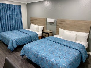Deluxe Room, 2 Queen Beds, Smoking | Desk, blackout drapes, iron/ironing board, free WiFi - Budget Host Inn (Vernon)