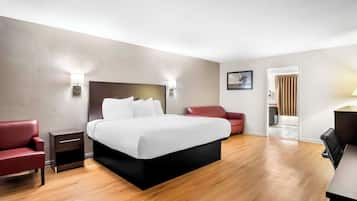 Suite, 1 très grand lit, non-fumeur | Bureau, rideaux d’obscurcissement, fer et planche à repasser