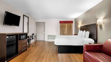 Suite, 1 King Bed, Non Smoking | Desk, blackout curtains, iron/ironing board, free cots/infant beds