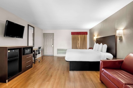 Suite, 1 King Bed, Non Smoking | Desk, blackout drapes, iron/ironing board, free cribs/infant beds