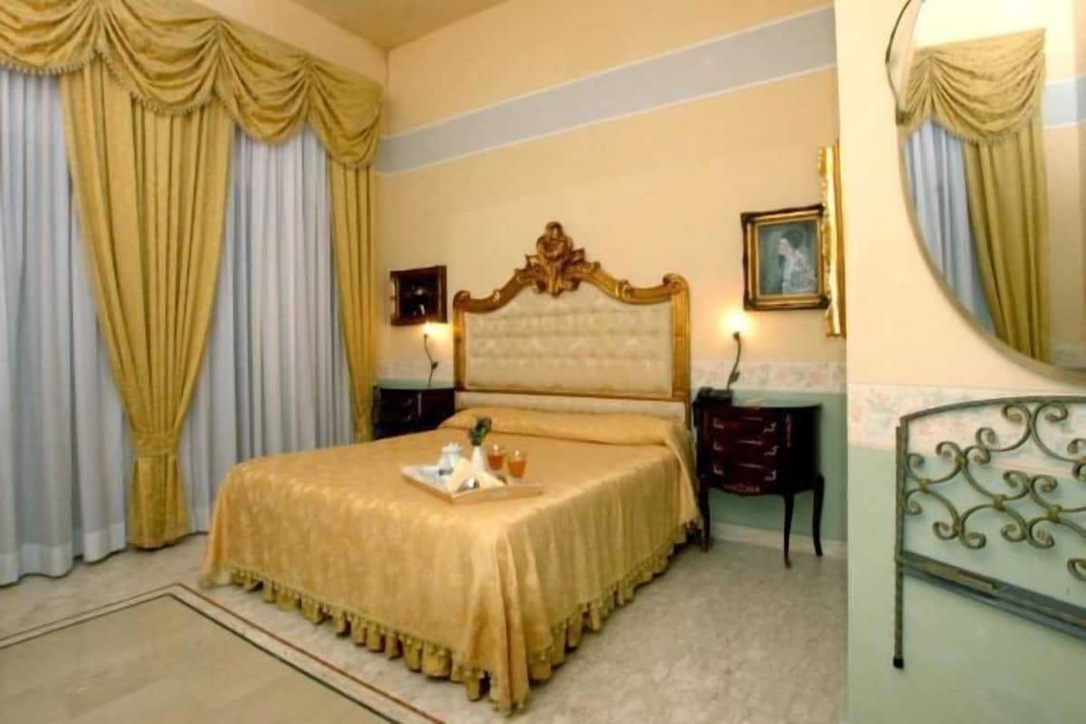 Biancheria da letto di alta qualità, minibar, una cassaforte in camera