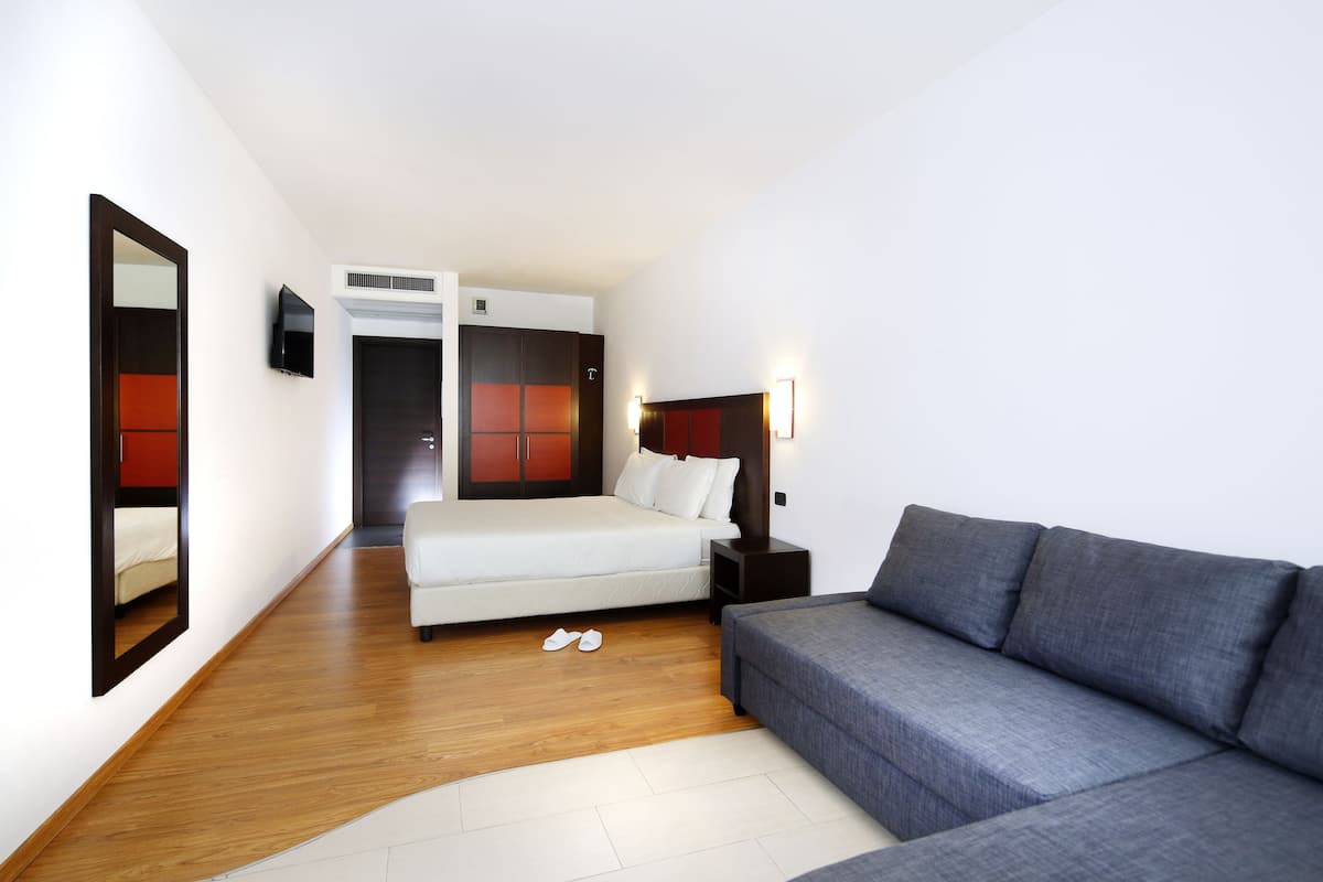 Family Room, 1 Bedroom | 1 bedroom, in-room safe, desk, blackout drapes