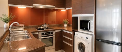 One Bedroom Horizon Suite with Bathtub (High Floor) | Private kitchen | Full-size fridge, microwave, electric kettle, cookware/dishes/utensils