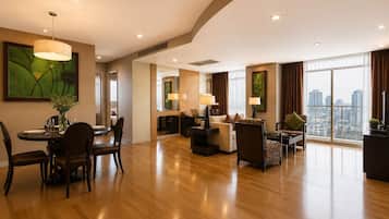 Two Bedroom Deluxe Suites | Living area | 32-inch LCD TV with satellite channels, TV, DVD player