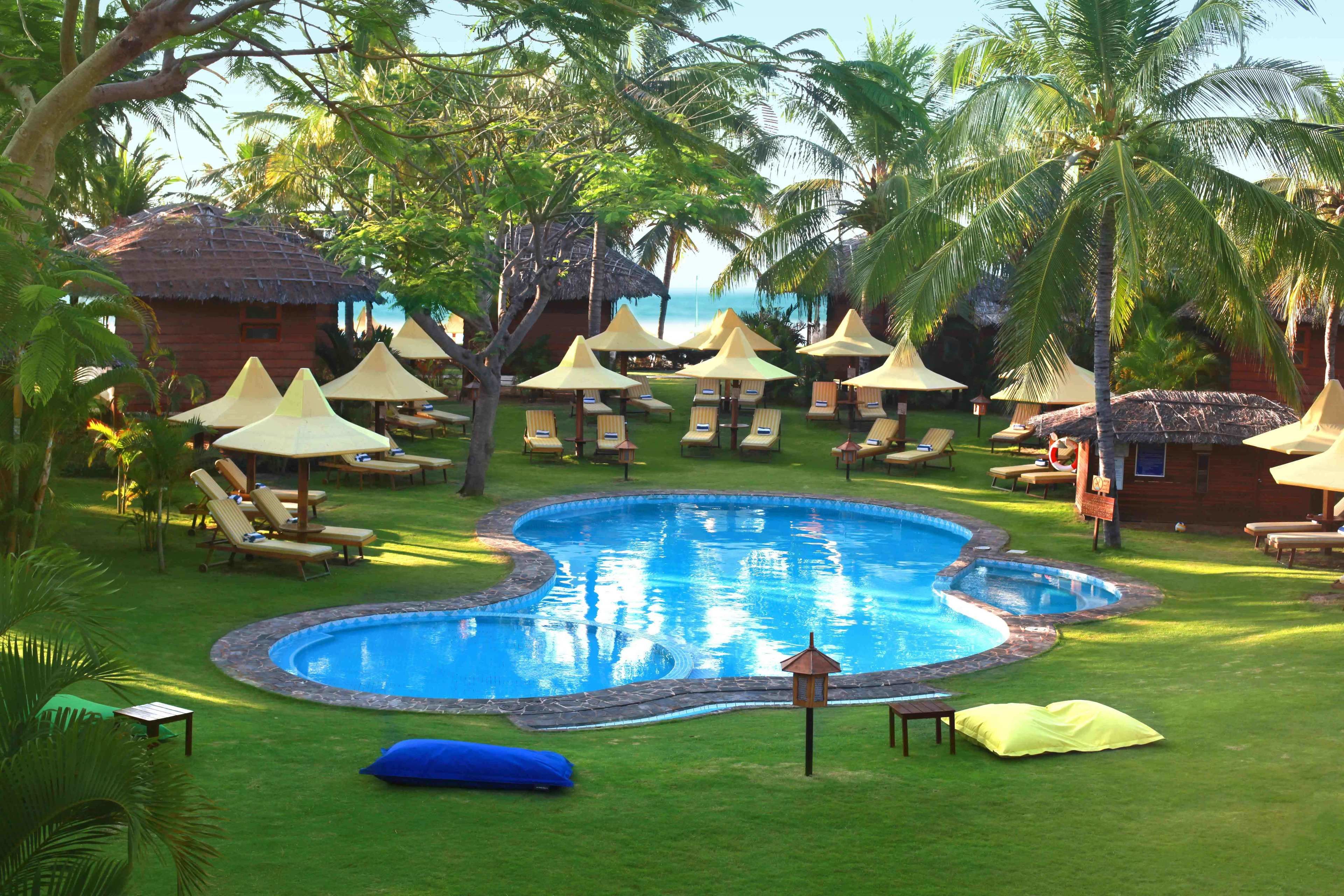 outdoor pool, pool umbrellas, pool loungers