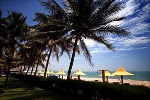 Private beach, white sand, free beach cabanas, sun loungers