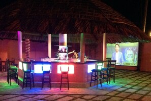 2 bars/lounges, poolside bar, beach bar