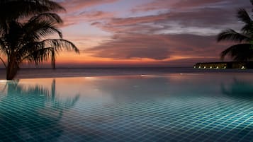 2 outdoor pools, open 6:00 AM to 8:00 PM, pool umbrellas, sun loungers