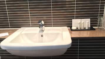 Rainfall showerhead, designer toiletries, hair dryer, towels
