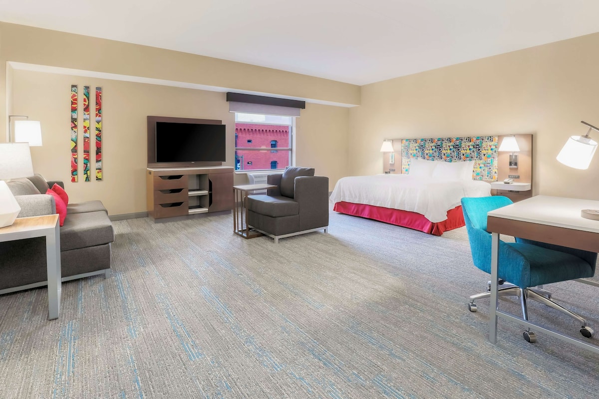 studio suite, 1 king bed, accessible | living area | 55-inch lcd tv with cable channels, tv