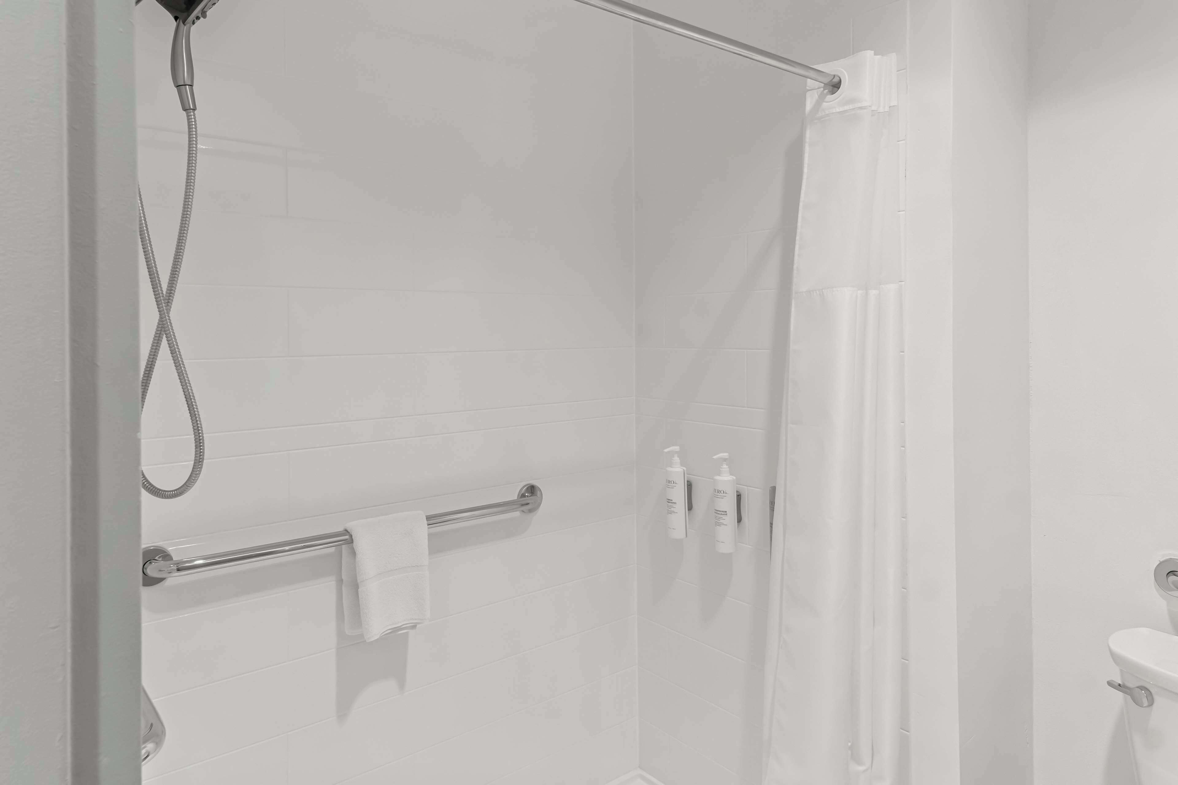 one king studio suite non smoking | bathroom | designer toiletries, hair dryer, towels, soap