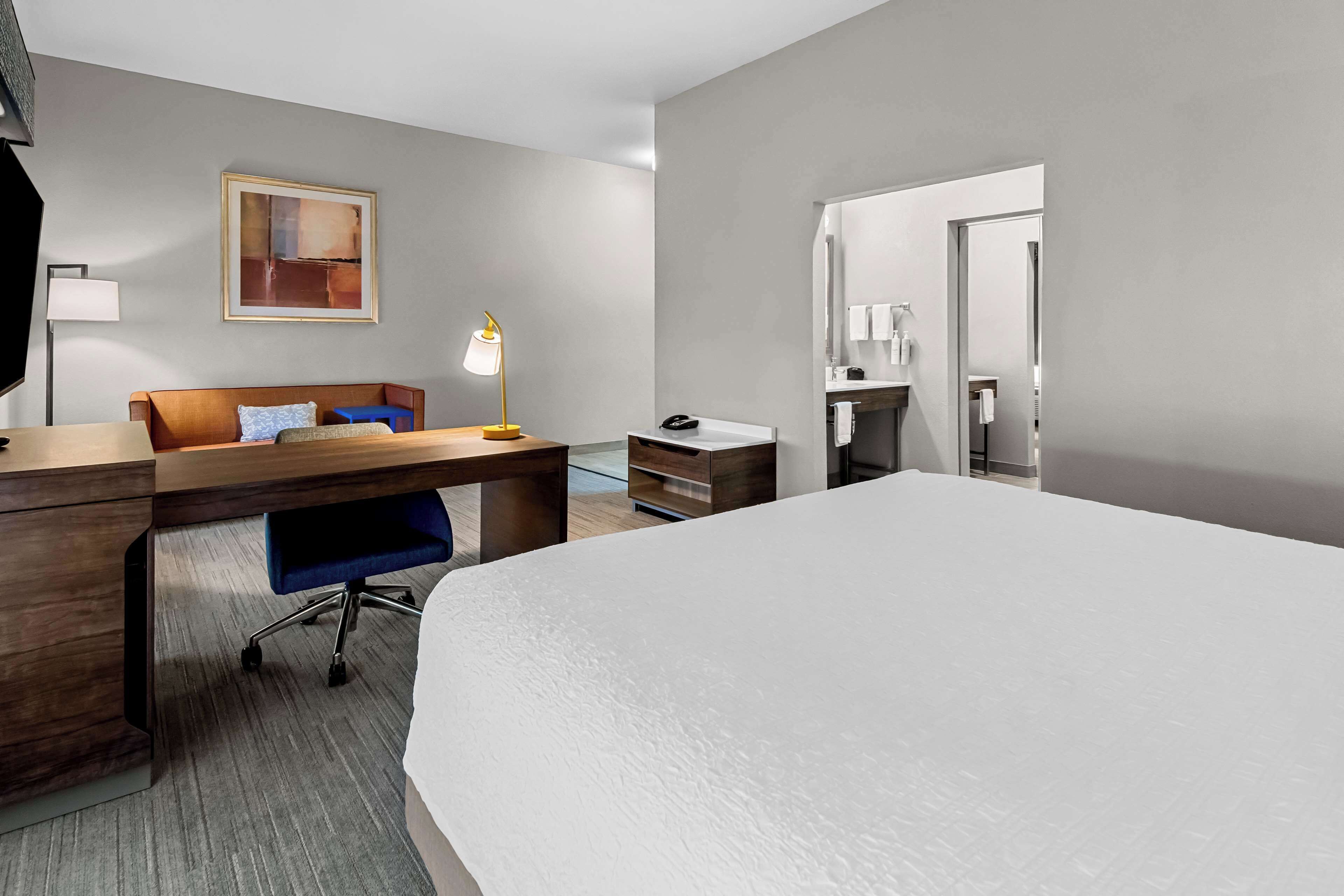 one king studio suite non smoking | living area | 50-inch smart tv with cable channels, netflix, hulu