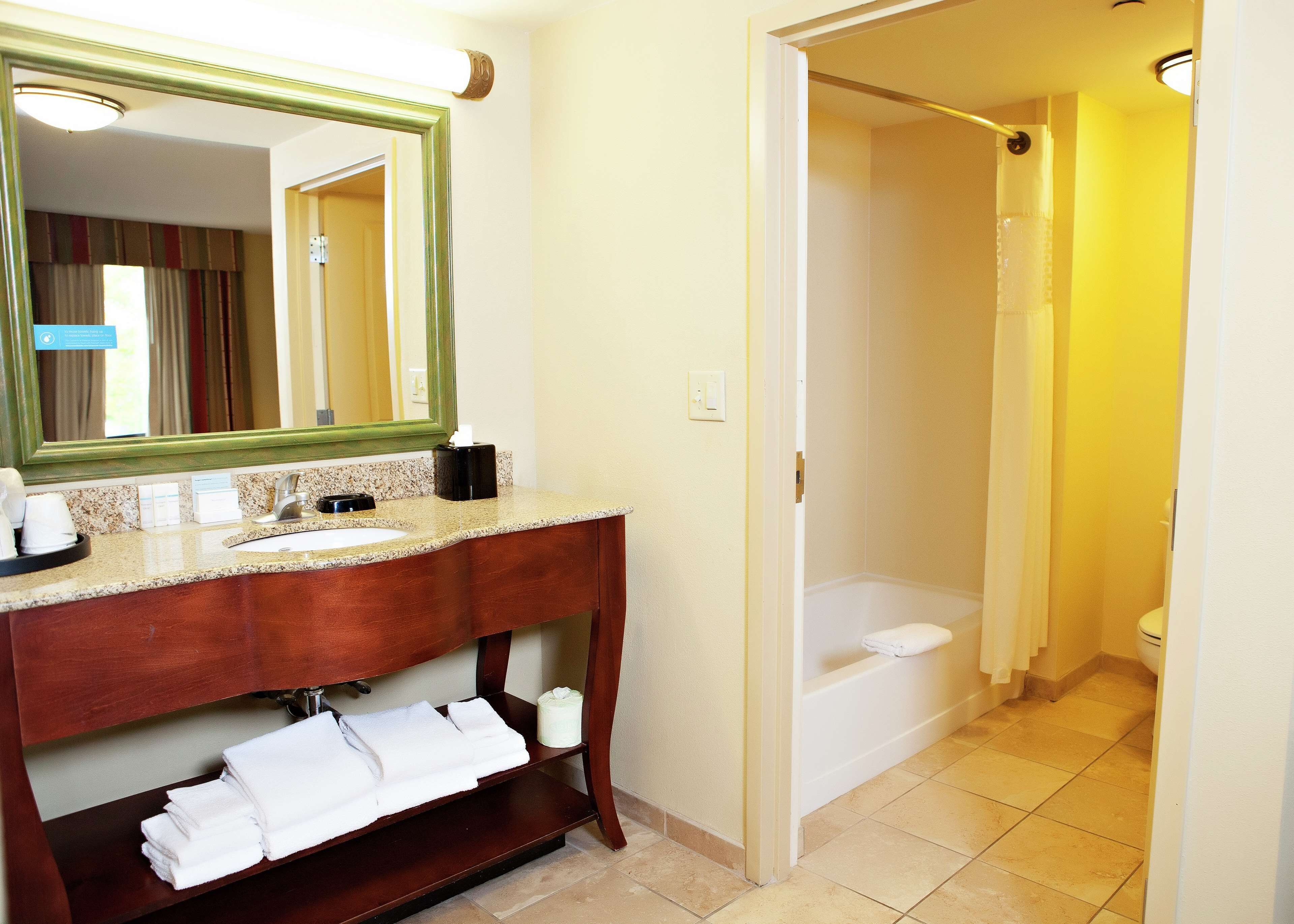 bathtub, hair dryer, towels