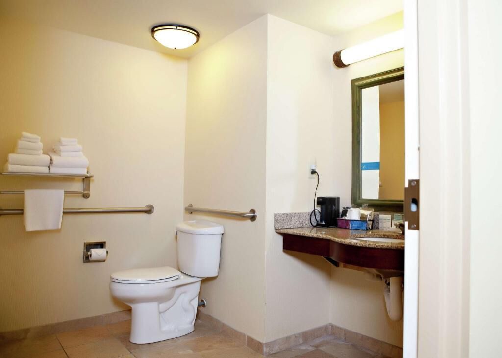 Bathtub, hair dryer, towels