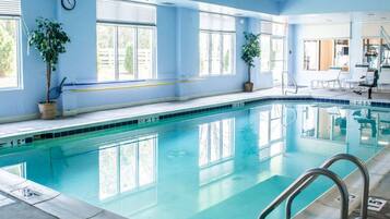 Relax by the pool with a view of the surrounding area.