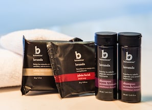 Shower, designer toiletries, towels