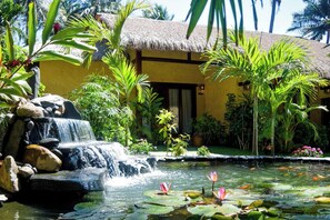 Sea Breeze Bungalow | Down duvets, minibar, in-room safe, desk - Bamboo Village Beach Resort & Spa (Phan Thiet)