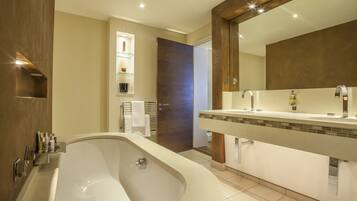 Designer toiletries, hair dryer, bathrobes, slippers