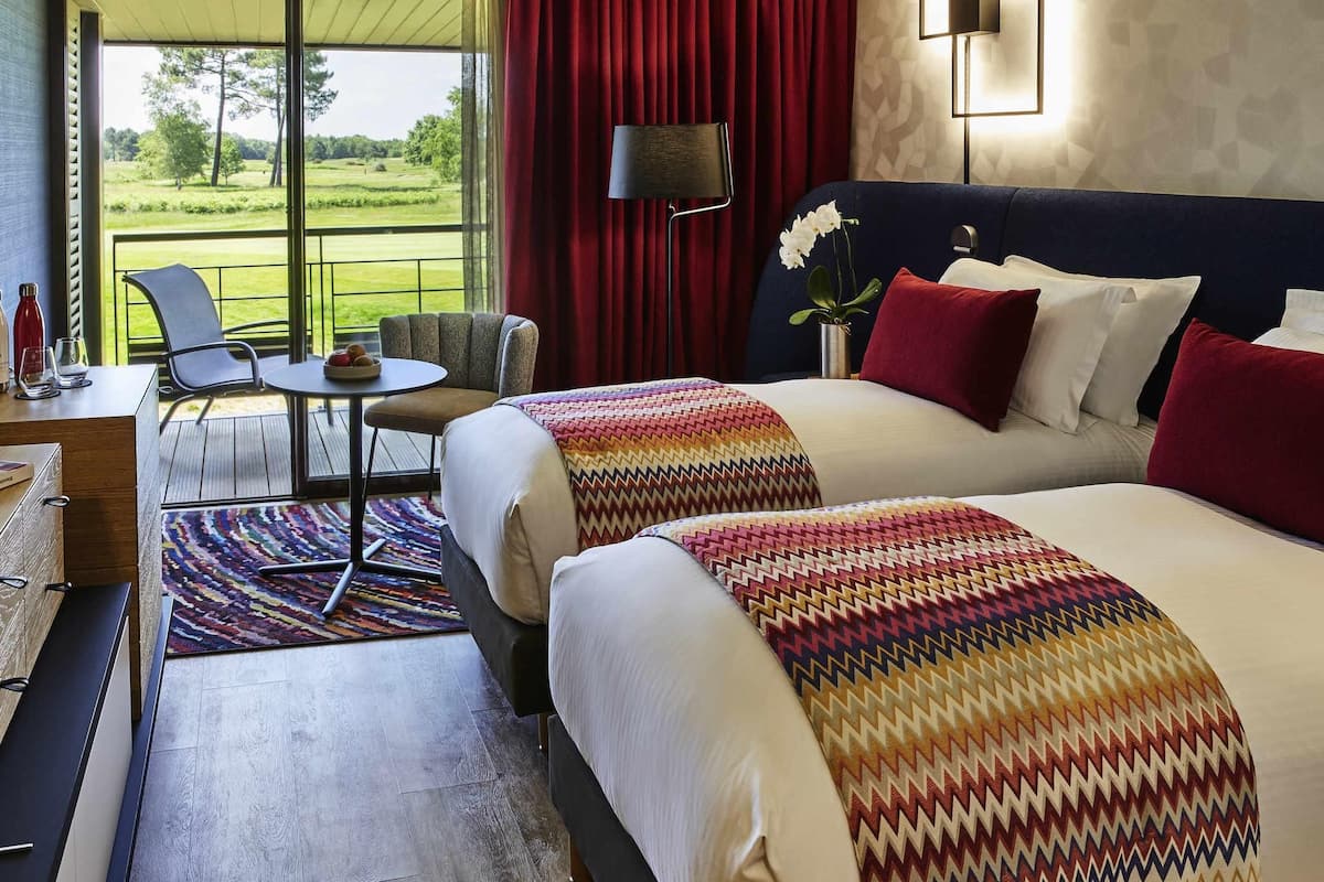 Premium bedding, pillowtop beds, minibar, in-room safe