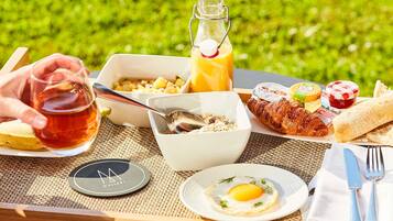 Daily buffet breakfast (EUR 26 per person)