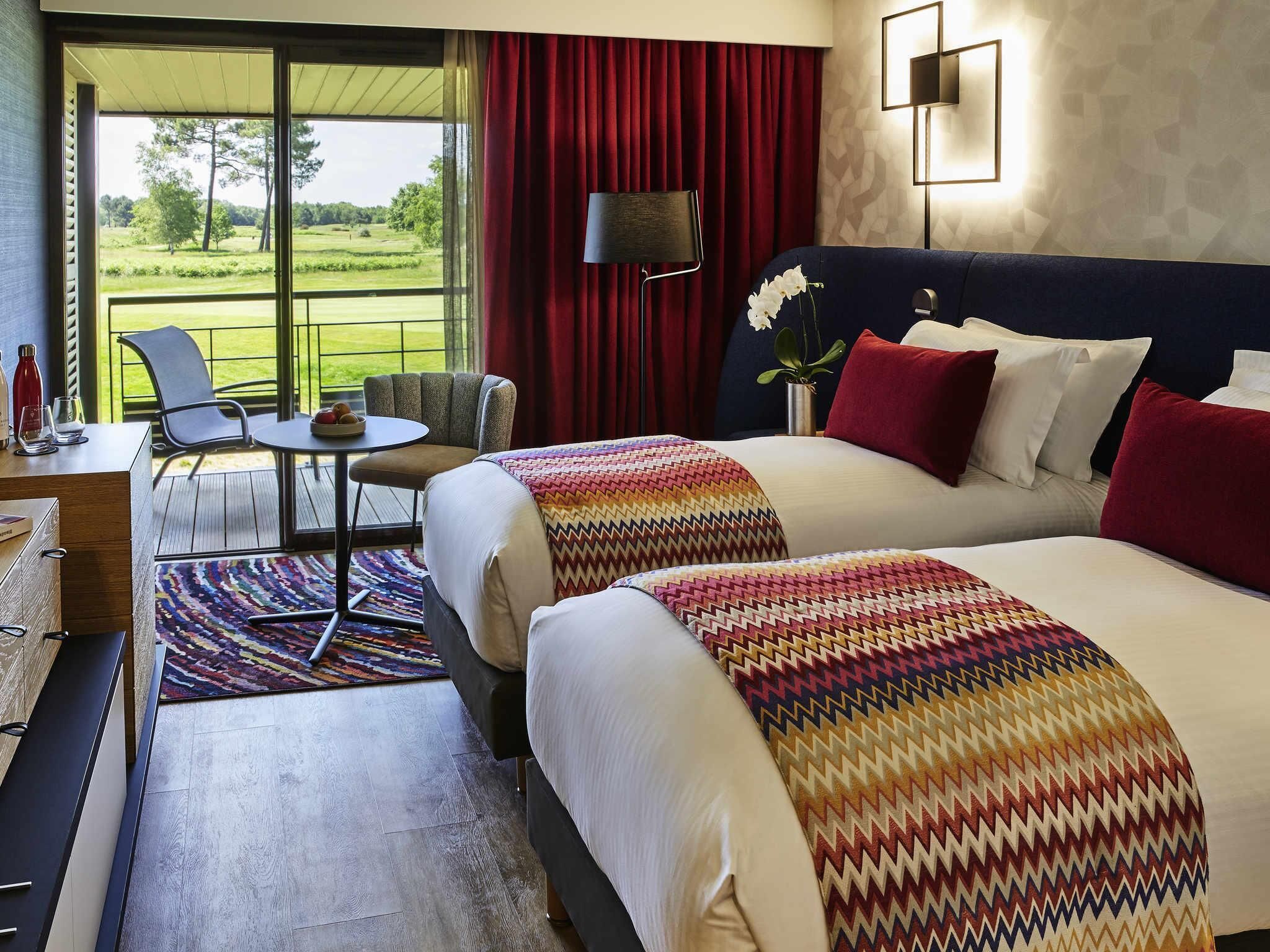 Chambre Deluxe, 2 lits une place, terrasse | Literie de qualité supérieure, surmatelas, minibar