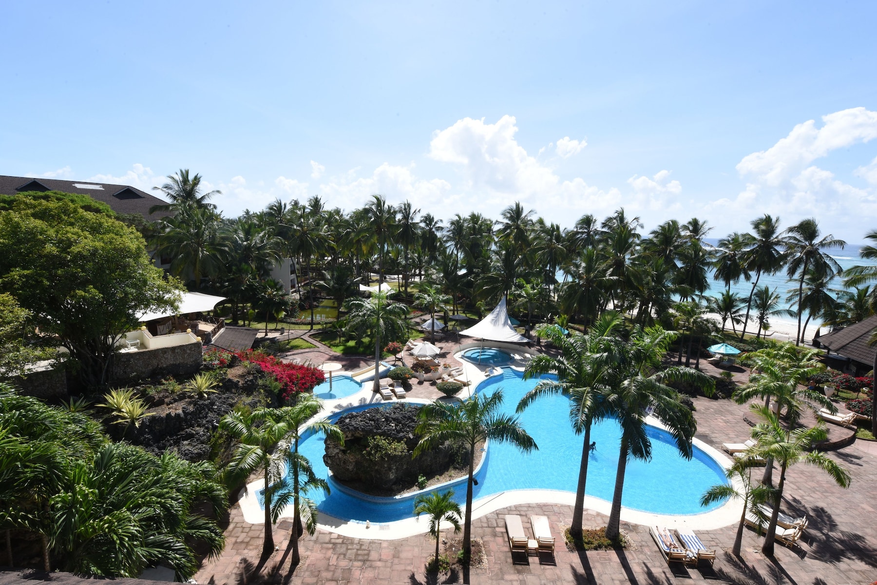 2 outdoor pools, pool umbrellas, pool loungers