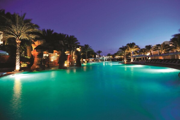 2 outdoor pools, pool umbrellas, pool loungers