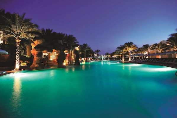 2 outdoor pools, pool umbrellas, pool loungers