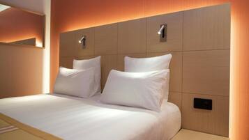 Ropa de cama de alta calidad y minibar con artículos gratuitos