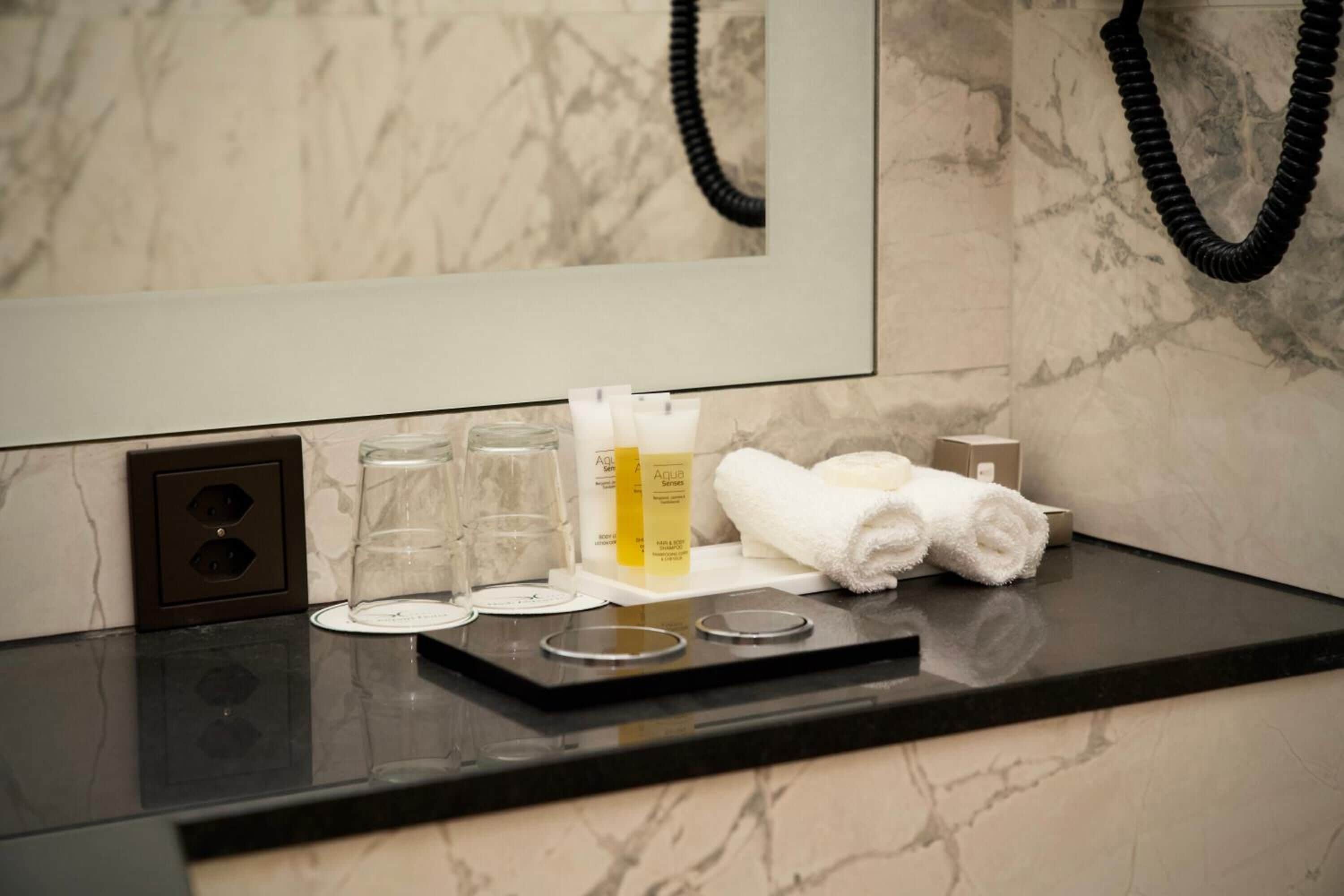 shower, free toiletries, hair dryer, towels