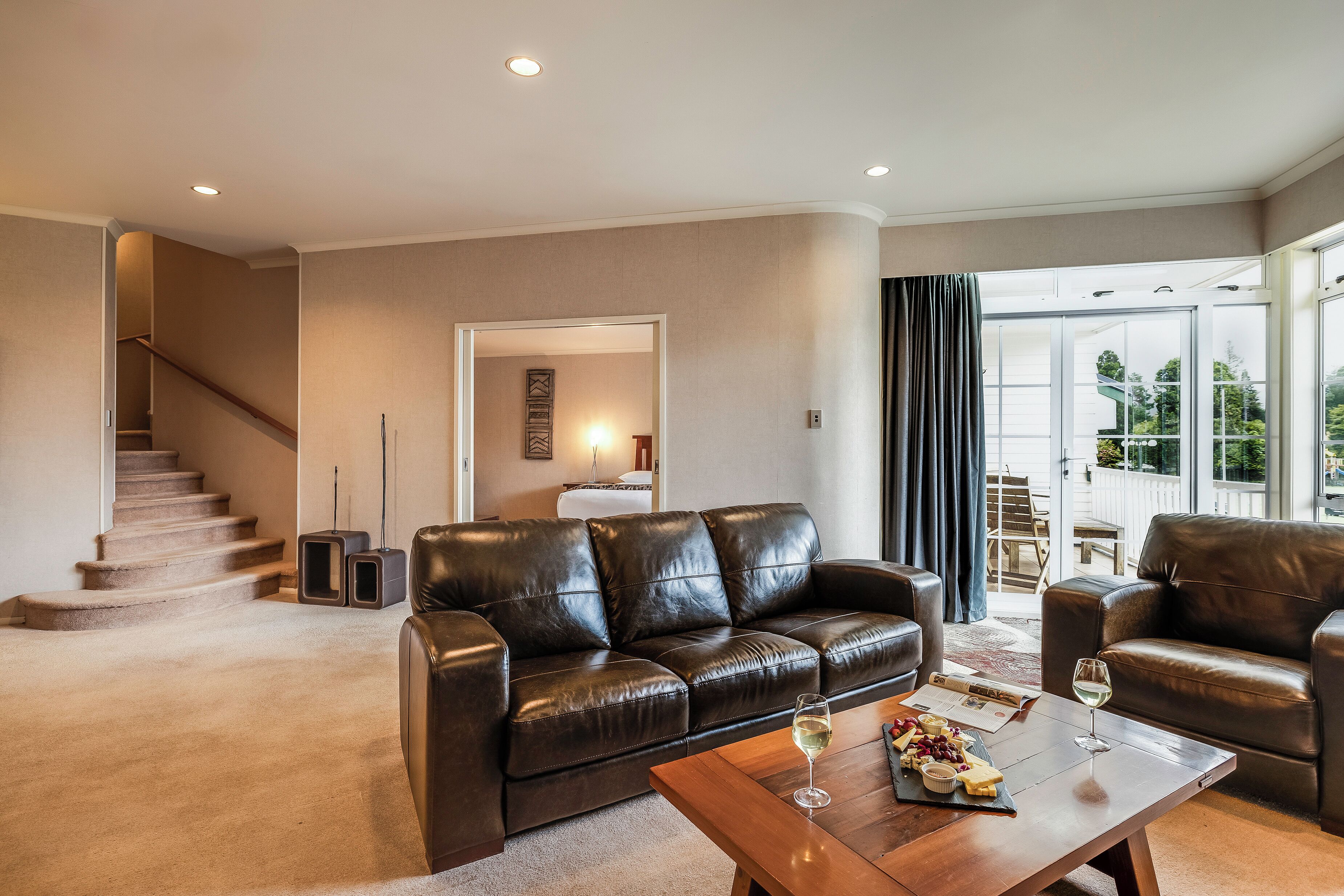 suite (rangatira) | living area | 32-inch tv with cable channels