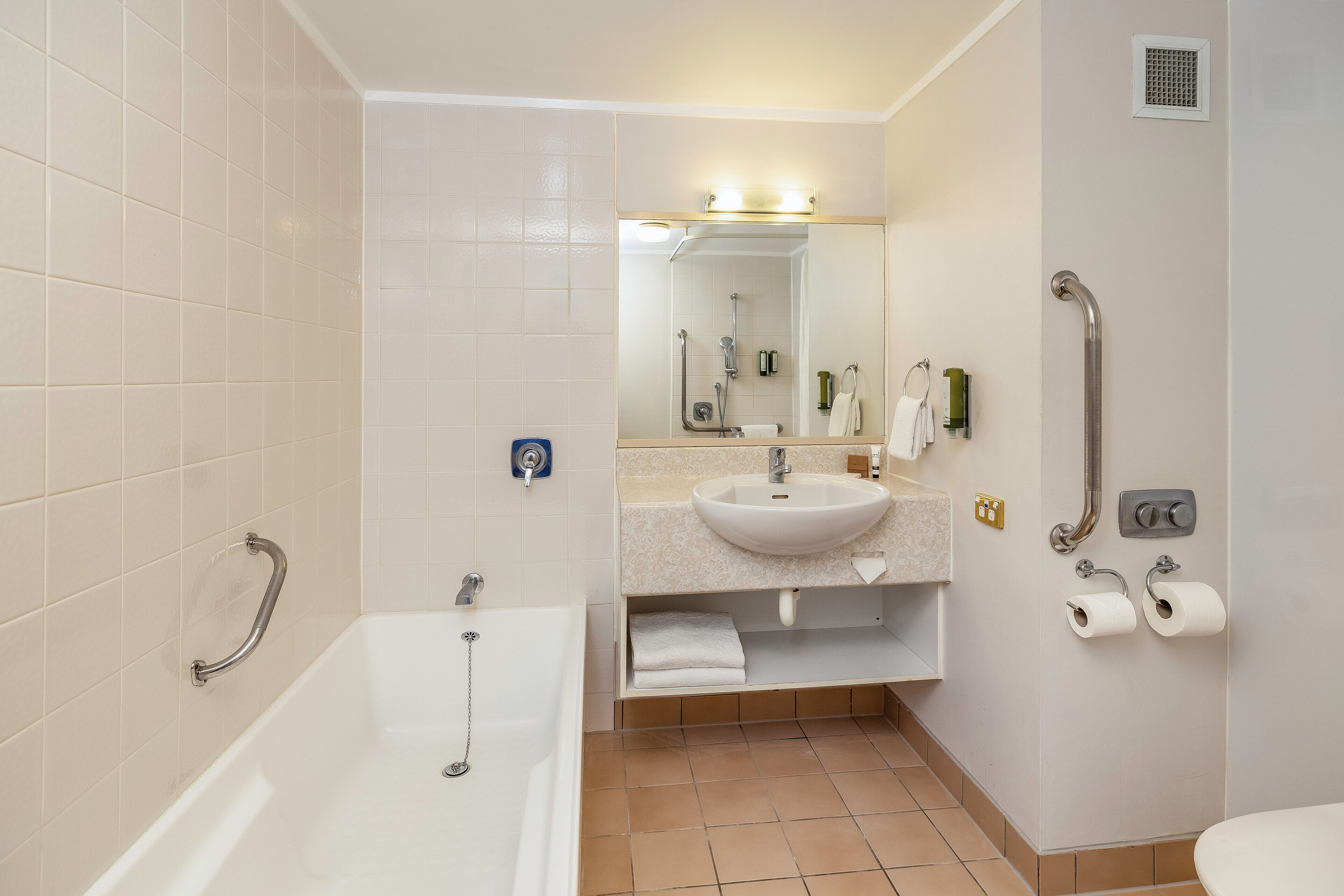 junior suite, 1 king bed | bathroom | hair dryer, towels, soap, shampoo