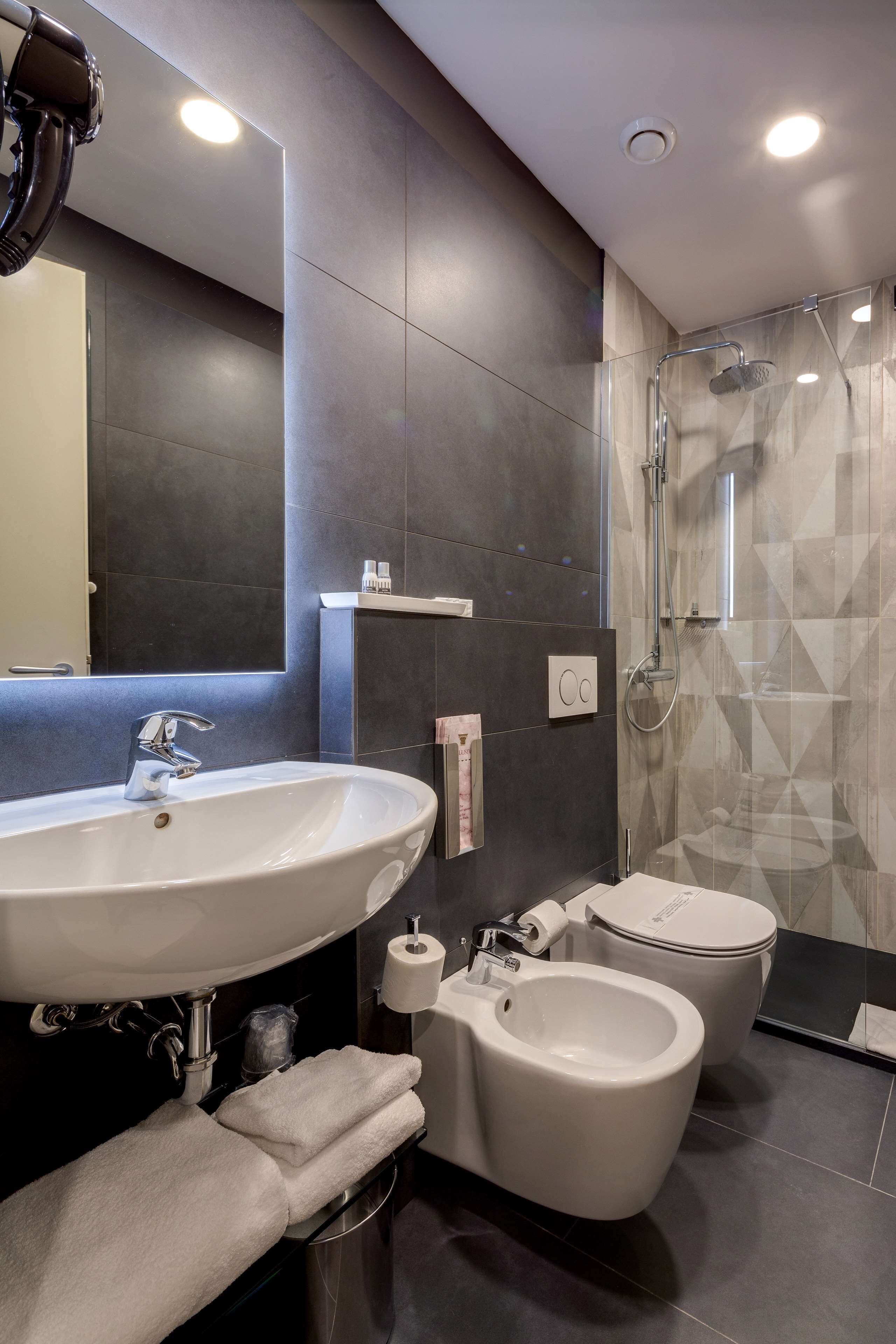superior room, 1 queen bed, non smoking | bathroom | free toiletries, hair dryer, towels