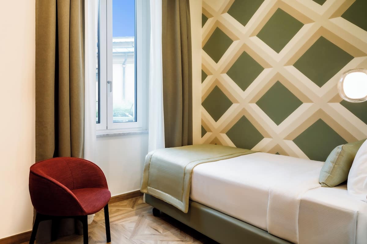 Economy Room, 1 Single Bed, Non Smoking | Hypo-allergenic bedding, minibar, in-room safe, desk
