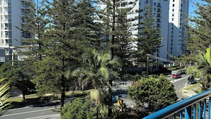 A residential area with tall buildings, a road, and a swimming pool. - San Mateo on Broadbeach (Broadbeach)