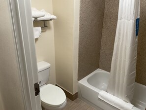 Combined shower/bathtub, hair dryer, bidet, towels - Budget Host Inn & Suites (Cameron)